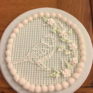 piped royal icing bird plaque