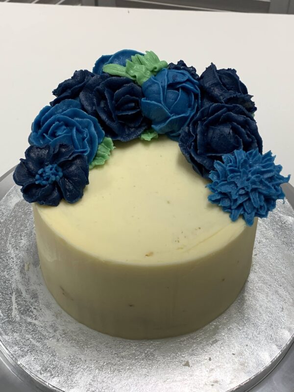 blue flowers on a cake
